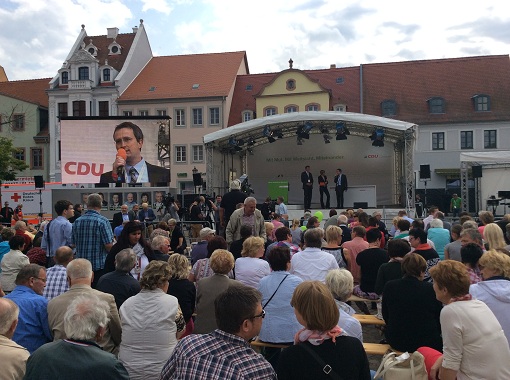 Oliver Fritzsche beim Besuch von Angela Merkel